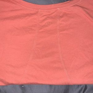 Orange muscle Lululemon crop tee